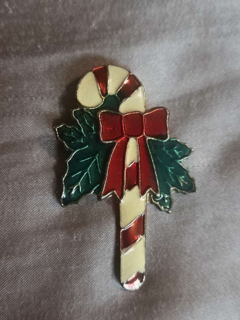 Festive Candy Cane Brooch with Red Bow and Green Leaves